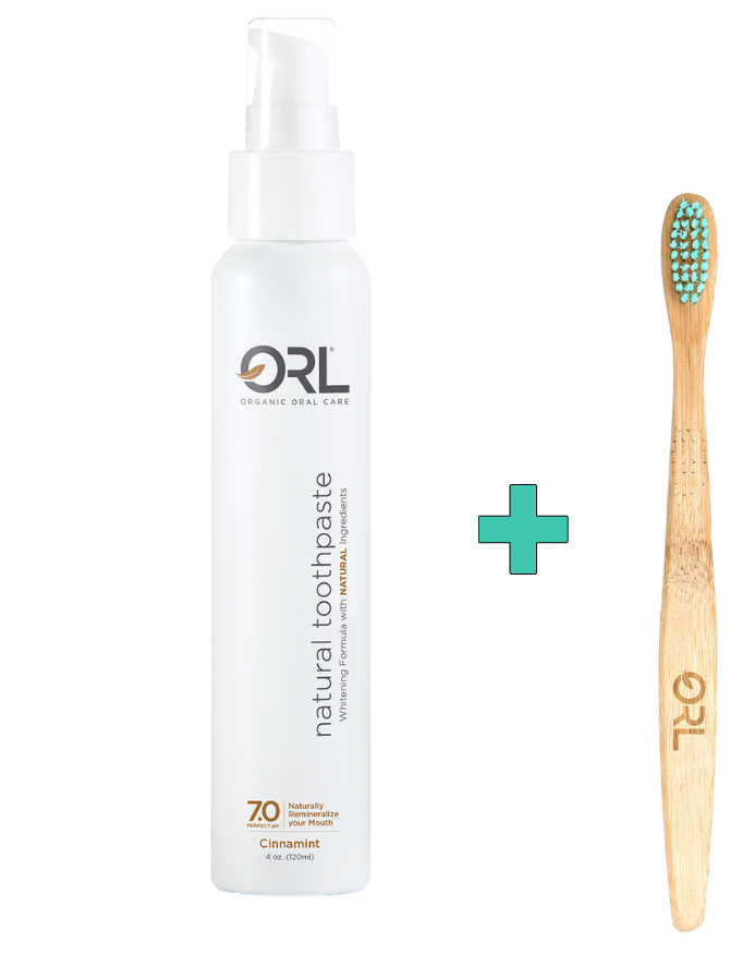A set of ORL natural fluoride-free toothbrushes with hydroxyapatite, including a toothpaste with a pump dispenser, and three toothbrushes with wooden handles and green bristles.